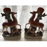 Two Staffordshire flat back figures of deer, 19thC. 31cms h.