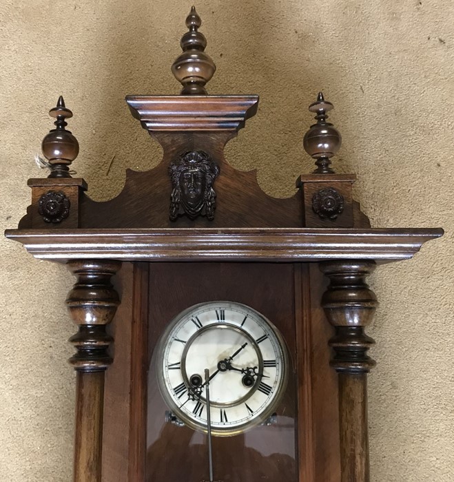 Walnut cased pendulum wall clock. DRGM movement. 100cms h x 41cms w with key. Condition - Image 3 of 3