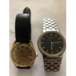 Two vintage gentleman's wristwatches, an Omega gold plated case with leather strap and a Seiko