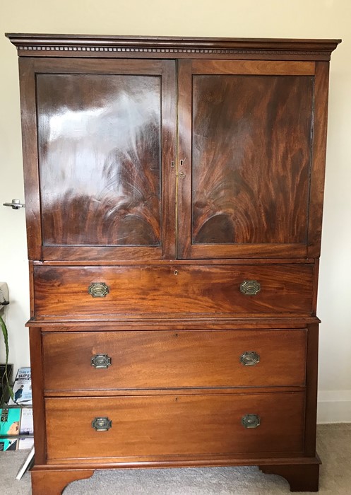 A 19thC mahogany press, lacking slides, 2 doors over 3 drawers. 118 w x 186 h x 55cms d.