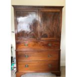 A 19thC mahogany press, lacking slides, 2 doors over 3 drawers. 118 w x 186 h x 55cms d.