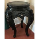 A carved hardwood stand, early 20thC. 50cms h.