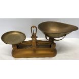 A pair of cast iron Avery scales with brass pans.