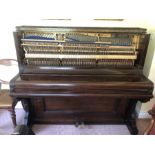 A good quality Julius Blüthner of Leipzig upright piano. 127 h x 157 w x 70cms d.