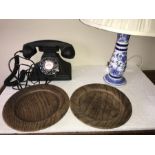 Reproduction black telephone with silver coloured dial together with blue and white ceramic lamp +