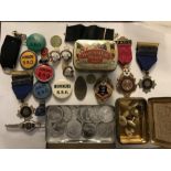 A miscellany to include badges, medals, vintage Shell petrol car coins, collar studs etc including