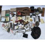 A large mixed lot of small collectables, cigarette cards, penknives, spectacles, nutcrackers, silver