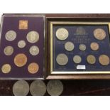 Framed British pre-decimal currency with cased 1970 decimal coins, 2 x 1977 crowns and a five