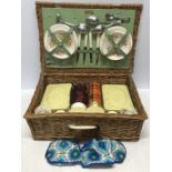 A Brexton wicker picnic hamper. Condition ReportOne hinge broken, missing closing straps.