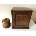 A mahogany smokers cabinet and tobacco jar. 26 h x 24 w x 18cms d.