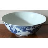 A Japanese blue and white pottery bowl. 18cms w.
