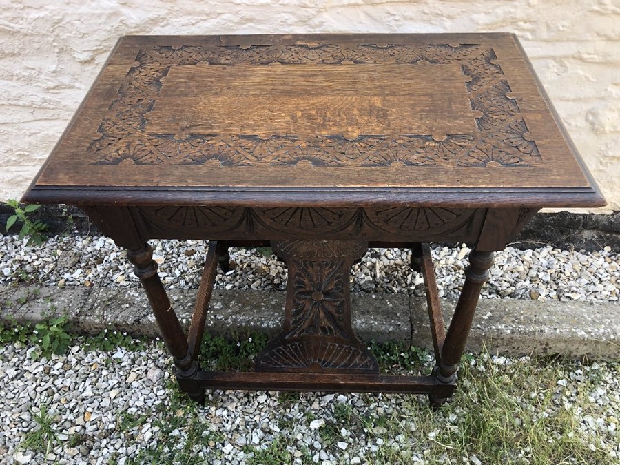 Oak carved top hall table. 85 w x 53 d x 75cms h.