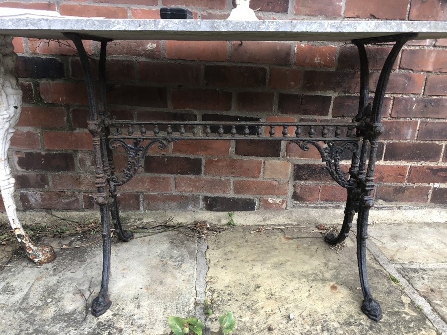 A 19thC cast iron table. 122 x 56cms.