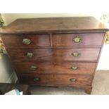 A 19thC mahogany chest of drawers, 2 short over 3 long drawers on bracket feet with brass handles.