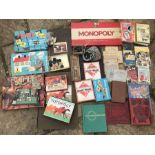 Collection of board games and books. Monopoly, Othello, Totopoly, Pairs, Tell Me, Marbles, Draughts,
