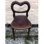 A 19thC high chair with balloon back.