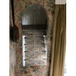 Arched bevel edged wall mirror. 53 w x 130cms h.