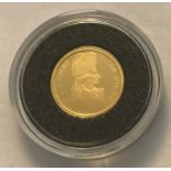 A 2005 one pound Alderney Horatio Nelson gold coin.