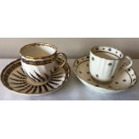 Puce marked Derby cup and saucer with Bloor Derby cup and saucer.