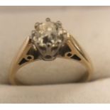A solitaire diamond ring set in 9 ct yellow metal. Size K. 2.2gms.