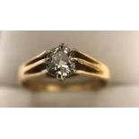A solitaire diamond ring set in 18 ct yellow gold, size Q. 3.6gms. Diamond size 5mm x5mm