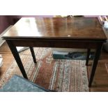 A 19thC mahogany foldover teatable with square tapered legs. 91 x 45 d x 76cms h.