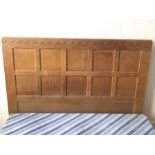 A Robert Mouseman Thompson 4' panelled bedstead.