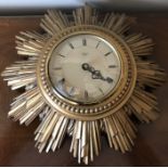 A Smiths Sectric Sunburn vintage wall clock. 32cms d.