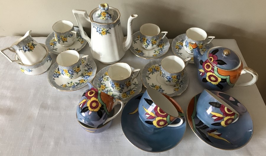 A bell china coffee service, coffee pot, six cups and saucers (1 a/f), milk and sugar with a bowl,