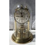 Ernest Jones brass dome cased anniversary clock, German made. 23cms h.