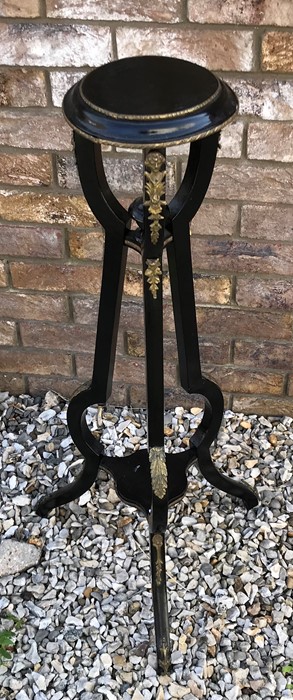 Black painted plant stand with decorative brass fittings, 90cms h. Condition ReportSplit to middle - Image 2 of 3