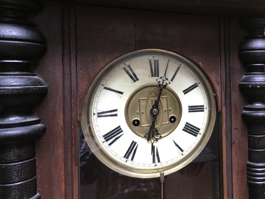 Large pendulum wall clock, porcelain dial with brass decoration. 137cms h including pediment. - Image 3 of 4