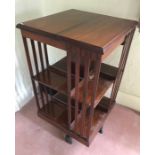 An Edwardian mahogany revolving bookcase. 48 x 48 x 88cms h.