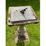 A reconstituted stone sundial.