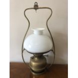 Vintage brass hanging oil lamp. 52cms h.