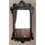 A late 19thC mahogany and gilt fretted wall mirror. 94 x 50cms.