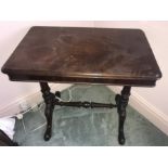 A mahogany occasional table. 76 w x 49 d x 74cms h.