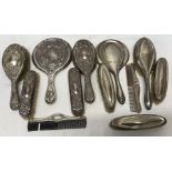 A six piece silver backed dressing table set, Chester 1912 together with six various silver backed