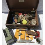 Meccano accessories in a brown leather case. 45 w x 30cms. Condition ReportPlayworn.