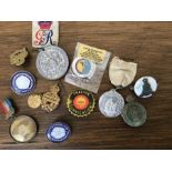 Twelve various vintage badges to include Shell tractor lubrication, Woman's Land Army etc.