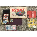 A selection of board games to include Waddingtons Risk, Monopoly, Cluedo and Scrabble.