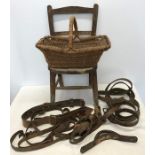 Childs chair, wicker basket and a selection of leather suitcase straps, leather belts with brass