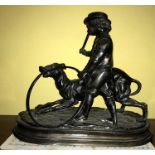 A bronze figure of a boy and dog, J. Moigner signed to back. 29 l x 26cms w.
