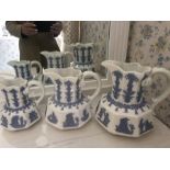 A set of 3 19thC graduated jugs. Largest 21cms.