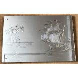 Large bevel edge wall mirror with engraved design of sail ship and desert island scene. 92 w x 61cms