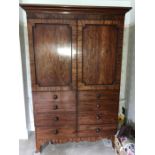 A 19thC mahogany inlaid double wardrobe on bracket feet with wooden knobs and lift off cornice,