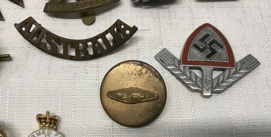 Collection of military cap badges and other pin badges, WW I tank pin badge, WW II German badge, - Image 2 of 3