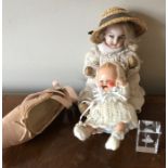 Two vintage dolls, one with bisque head, 15cms, ballet shoe 'en pointe' and a glass paperweight with