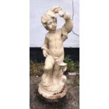 A glazed cherub, 49cms h with chips to base.