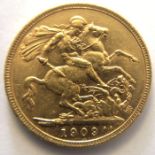 A 1909 gold sovereign.